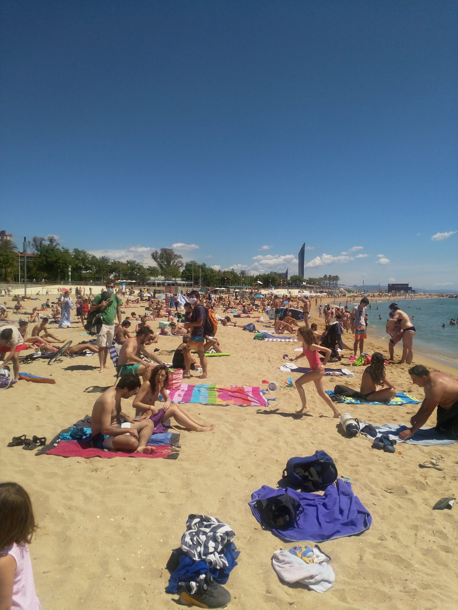 Nova Icaria beach with a lot of people in July