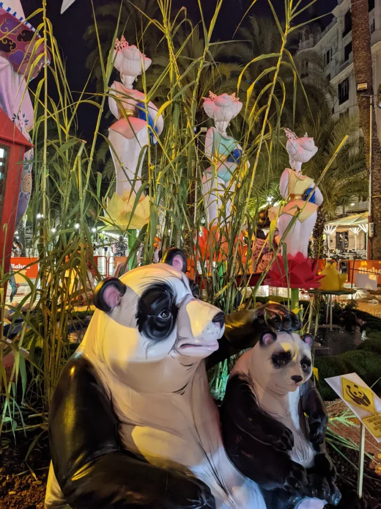 panda figures smiling