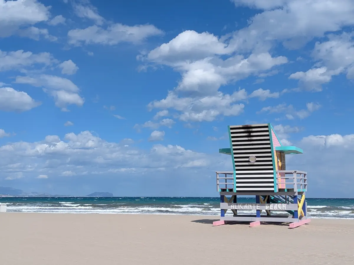 a colourful life saver's hut on Alicante beach 