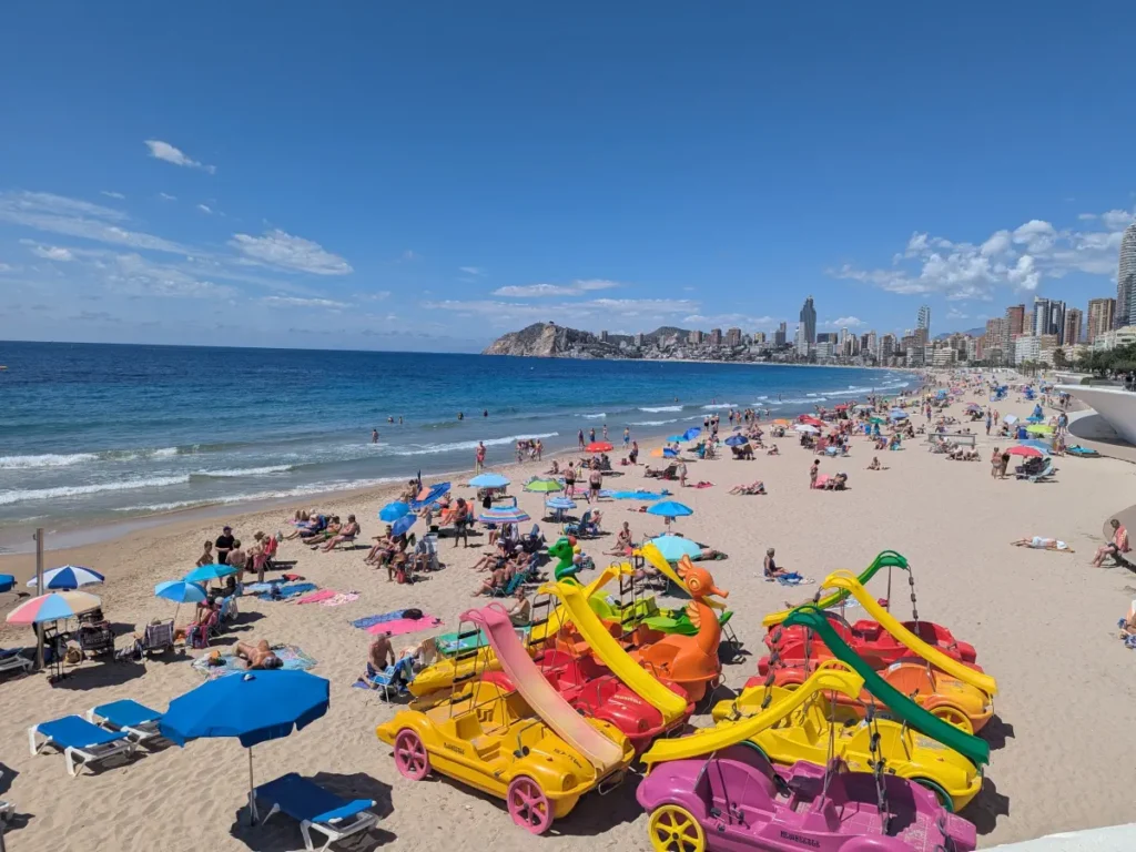 Benidorm beach with floating slides ready to rent.